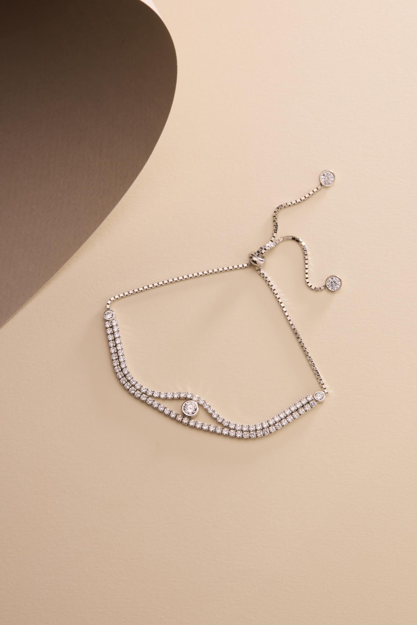 925 Ayar Gümüş Rodyum Kaplama Ayarlanabilir Asansörlü  Çift Sıra Su Yolu Tektaş Model Bileklik