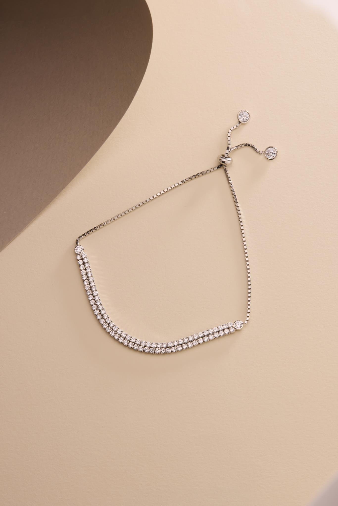 925 Ayar Gümüş Rodyum Kaplama Ayarlanabilir Asansörlü 2 mm Zirkon Taşlı Çift Sıra Su Yolu Bileklik