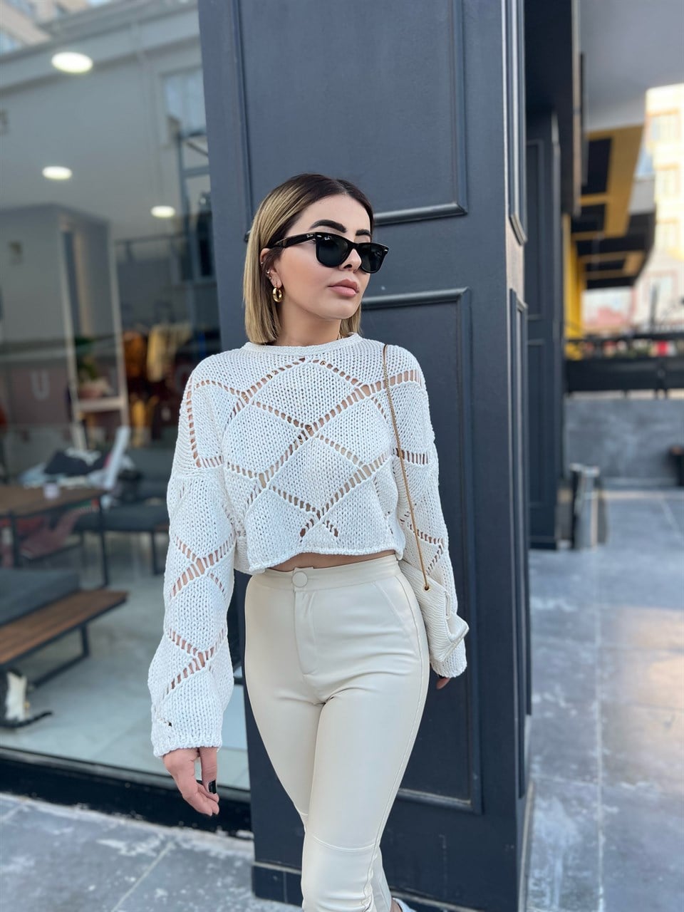 openwork patterned knitted blouse