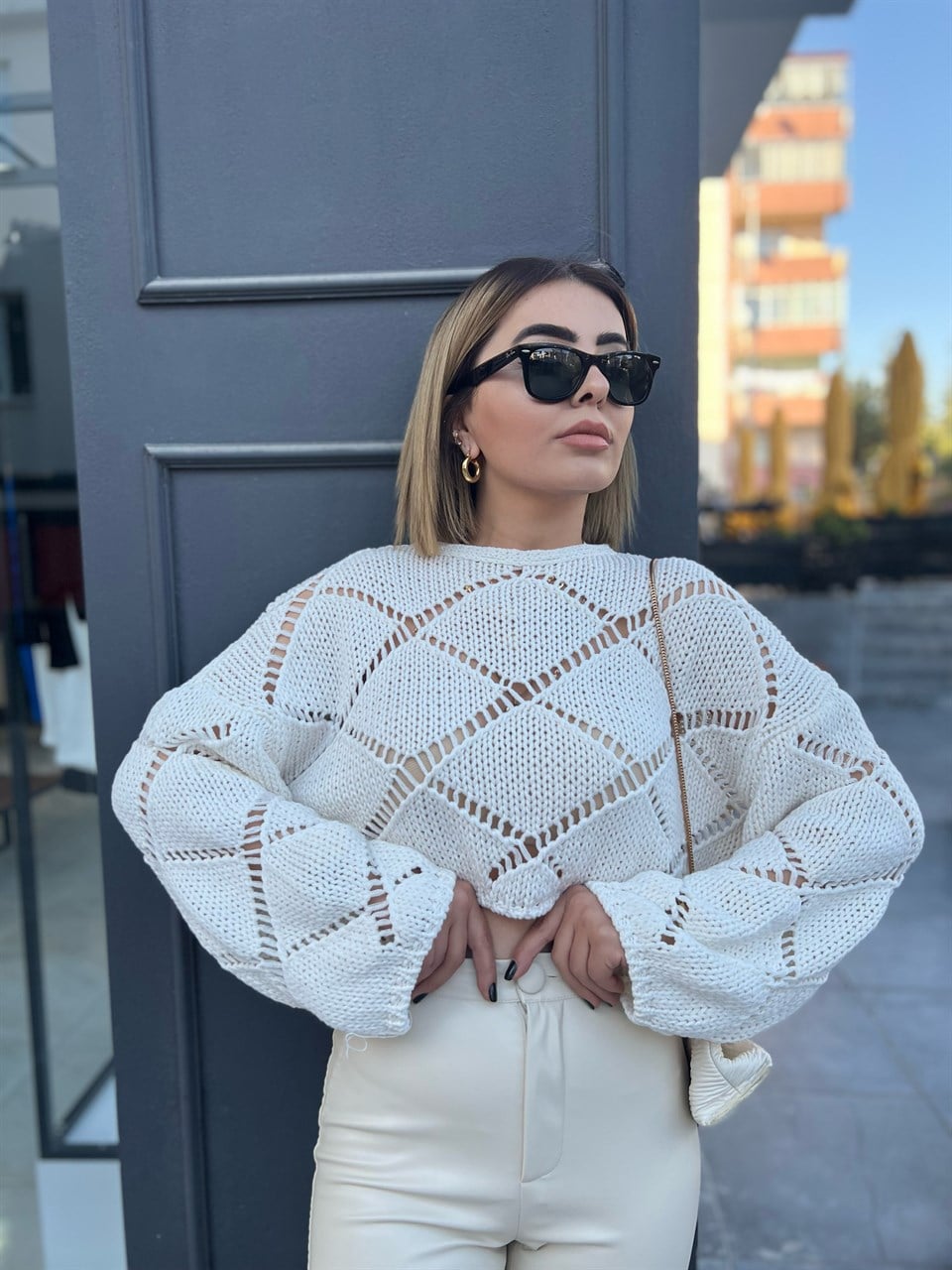 openwork patterned knitted blouse