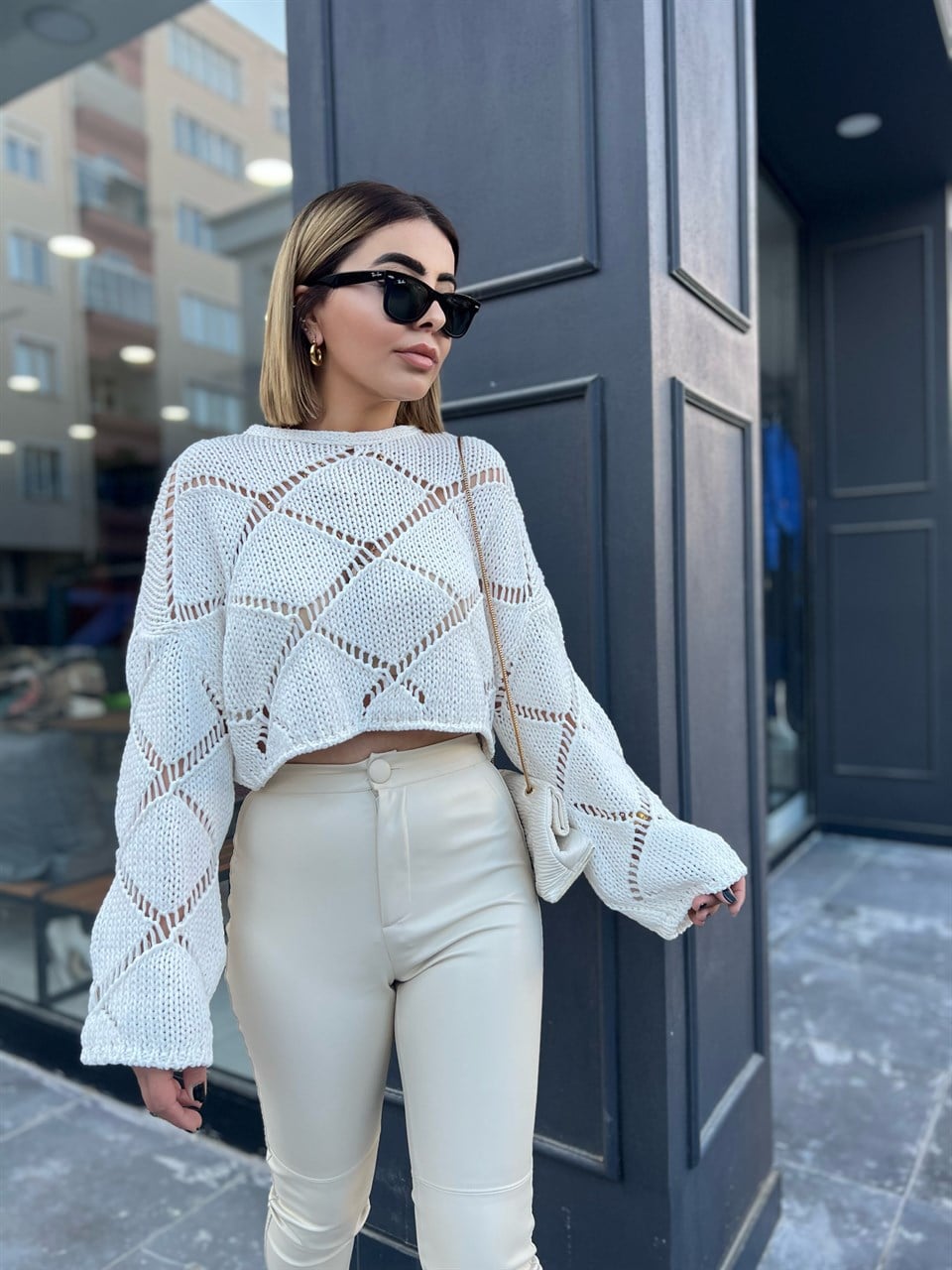openwork patterned knitted blouse