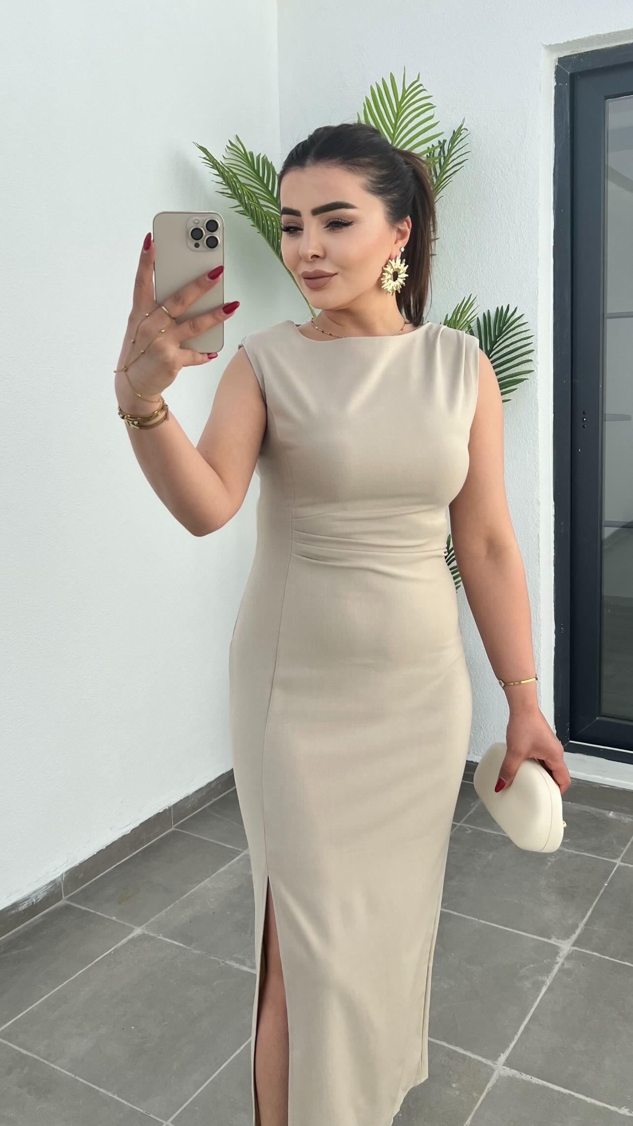 Beige Dress with Waist Drape, Slit Detail, and Padded Shoulders