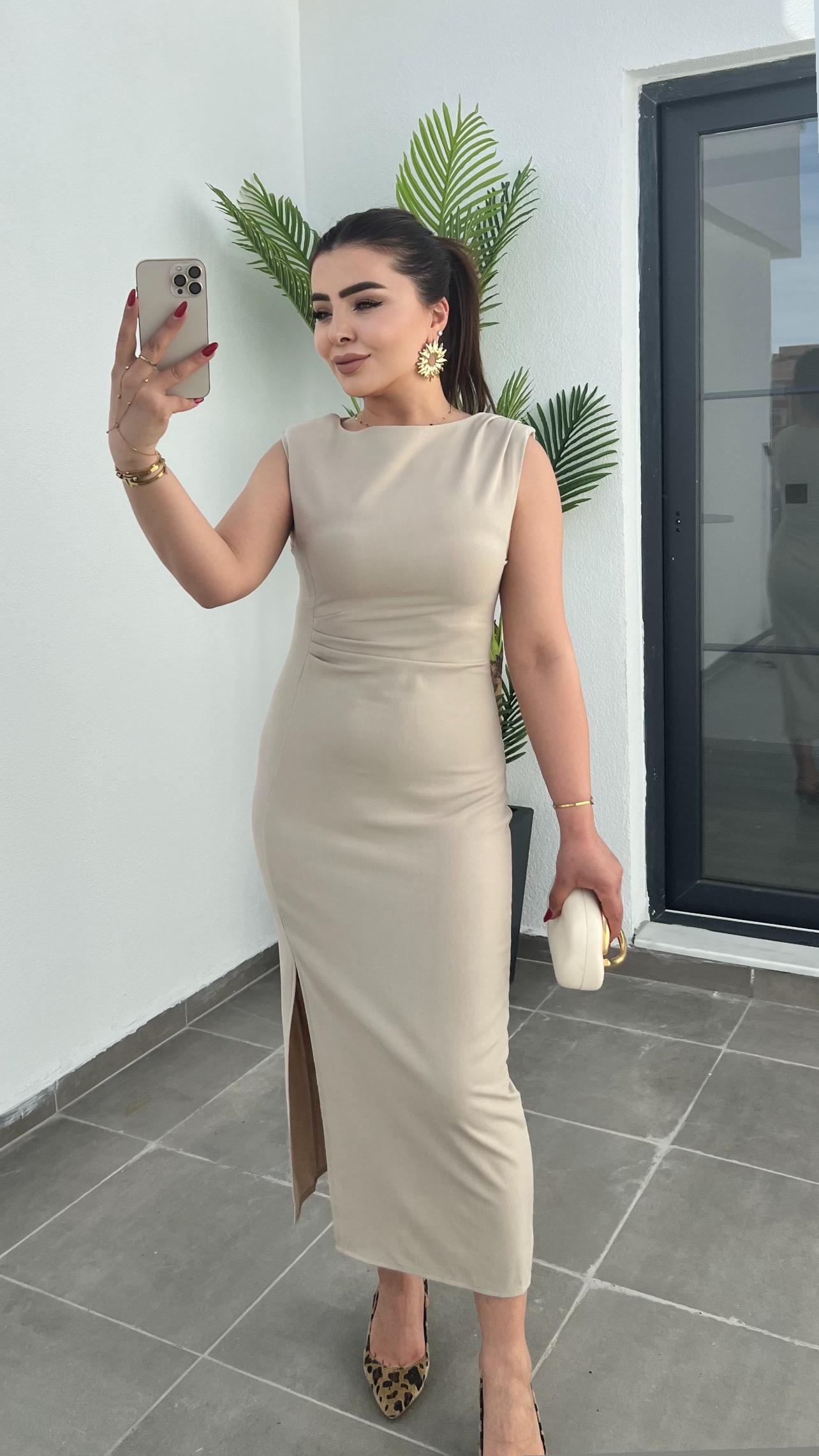 Beige Dress with Waist Drape, Slit Detail, and Padded Shoulders