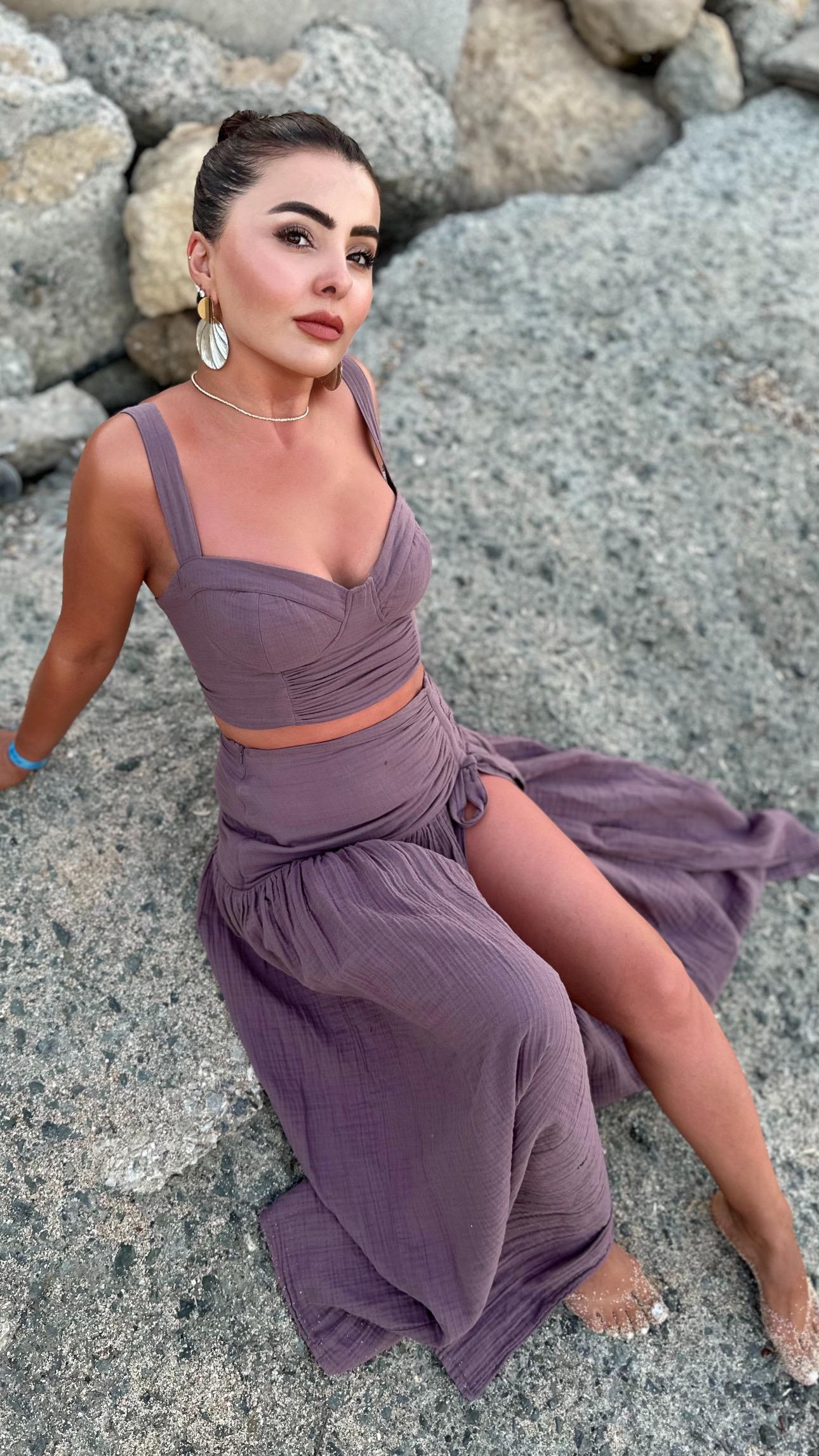 Plum-colored cropped muslin set with skirt.