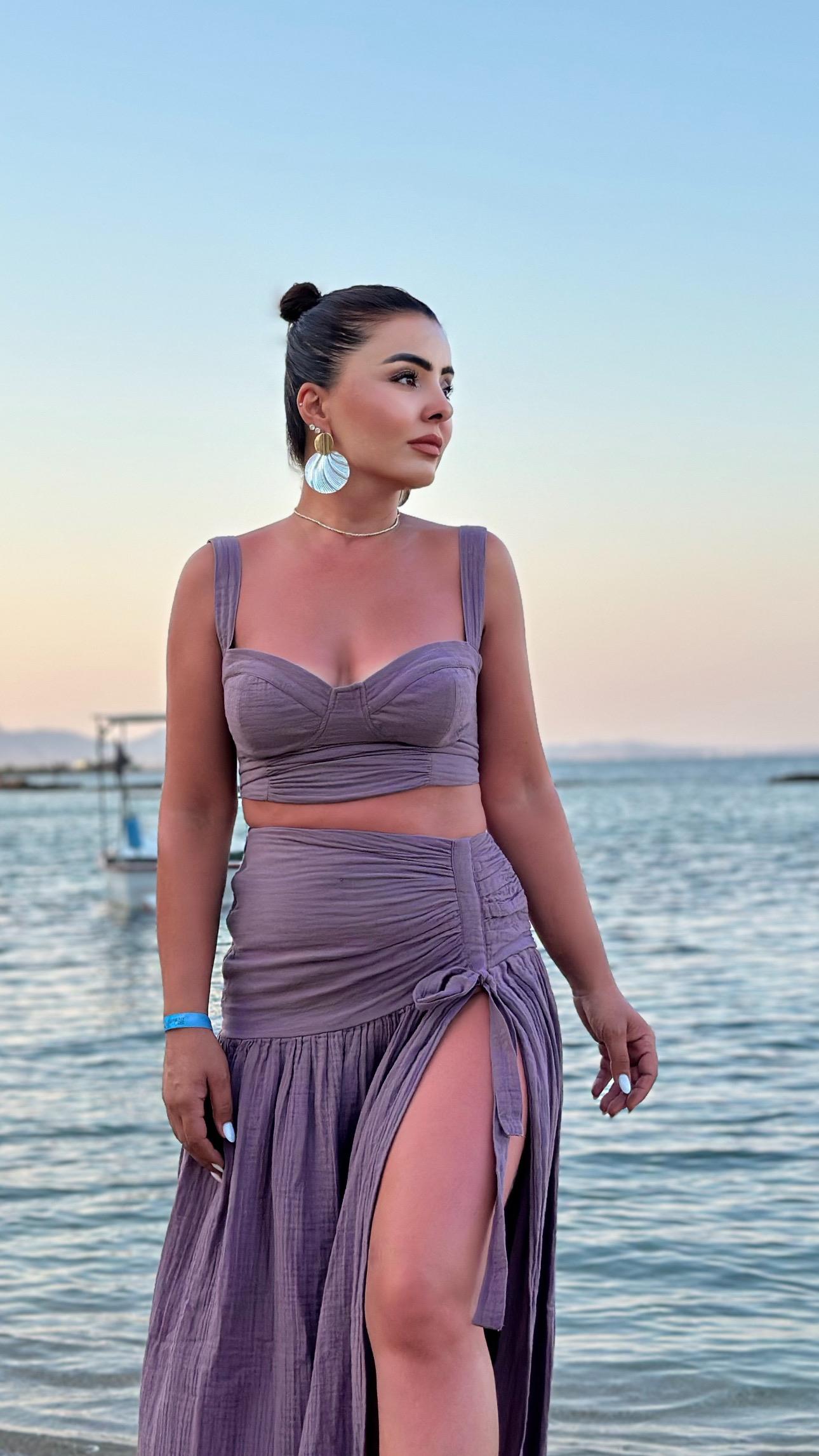 Plum-colored cropped muslin set with skirt.