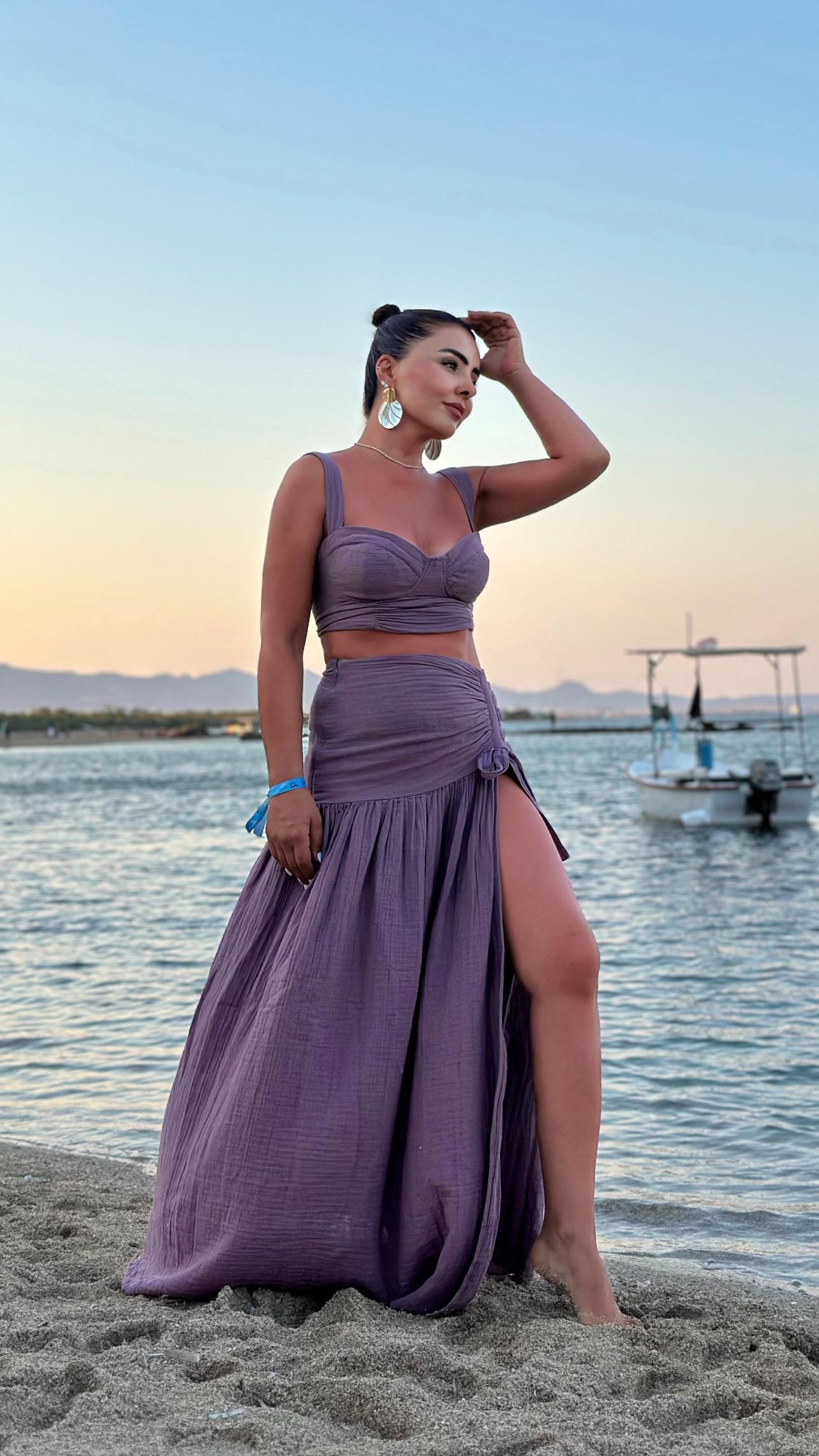 Plum-colored cropped muslin set with skirt.