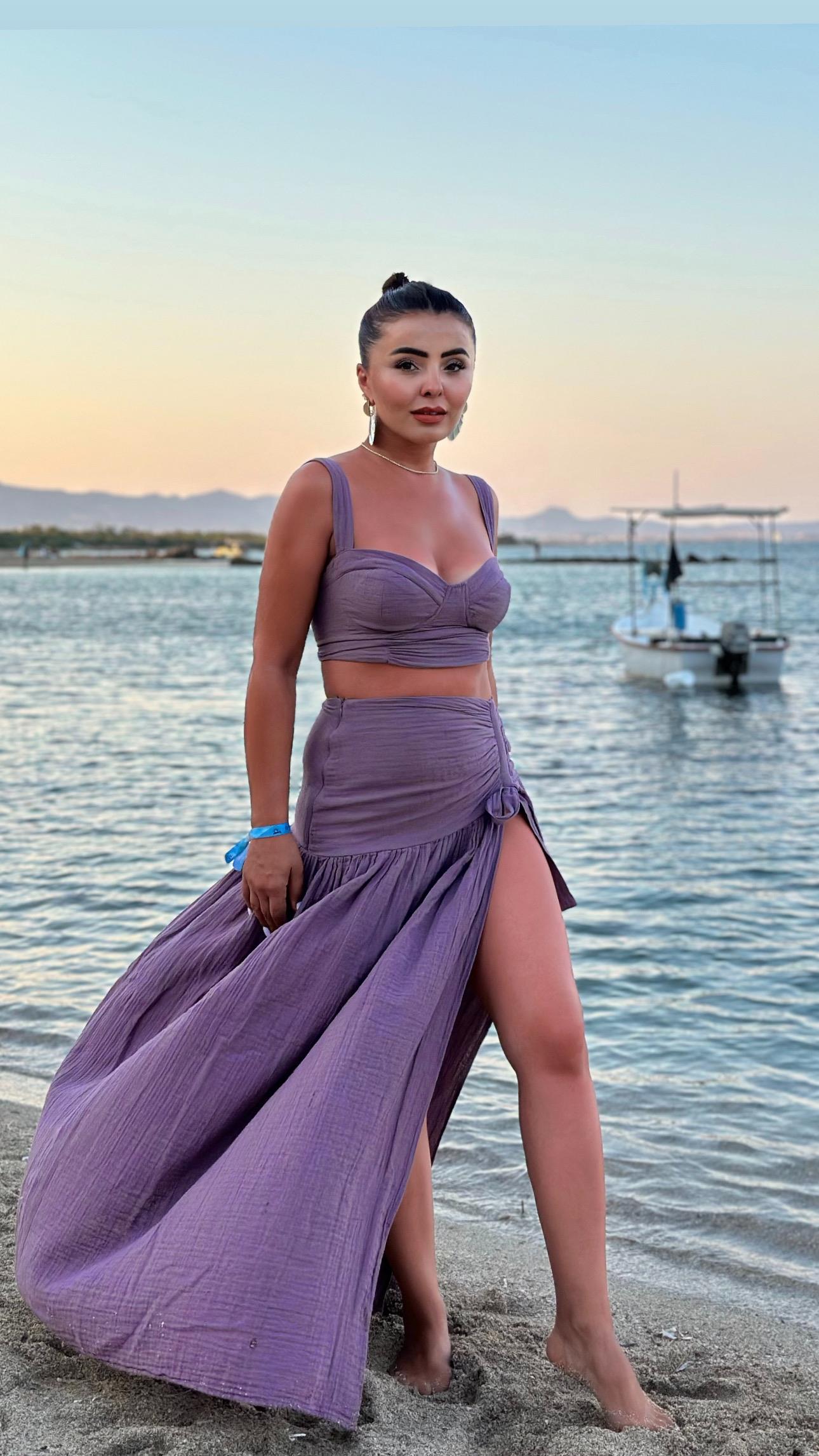 Plum-colored cropped muslin set with skirt.