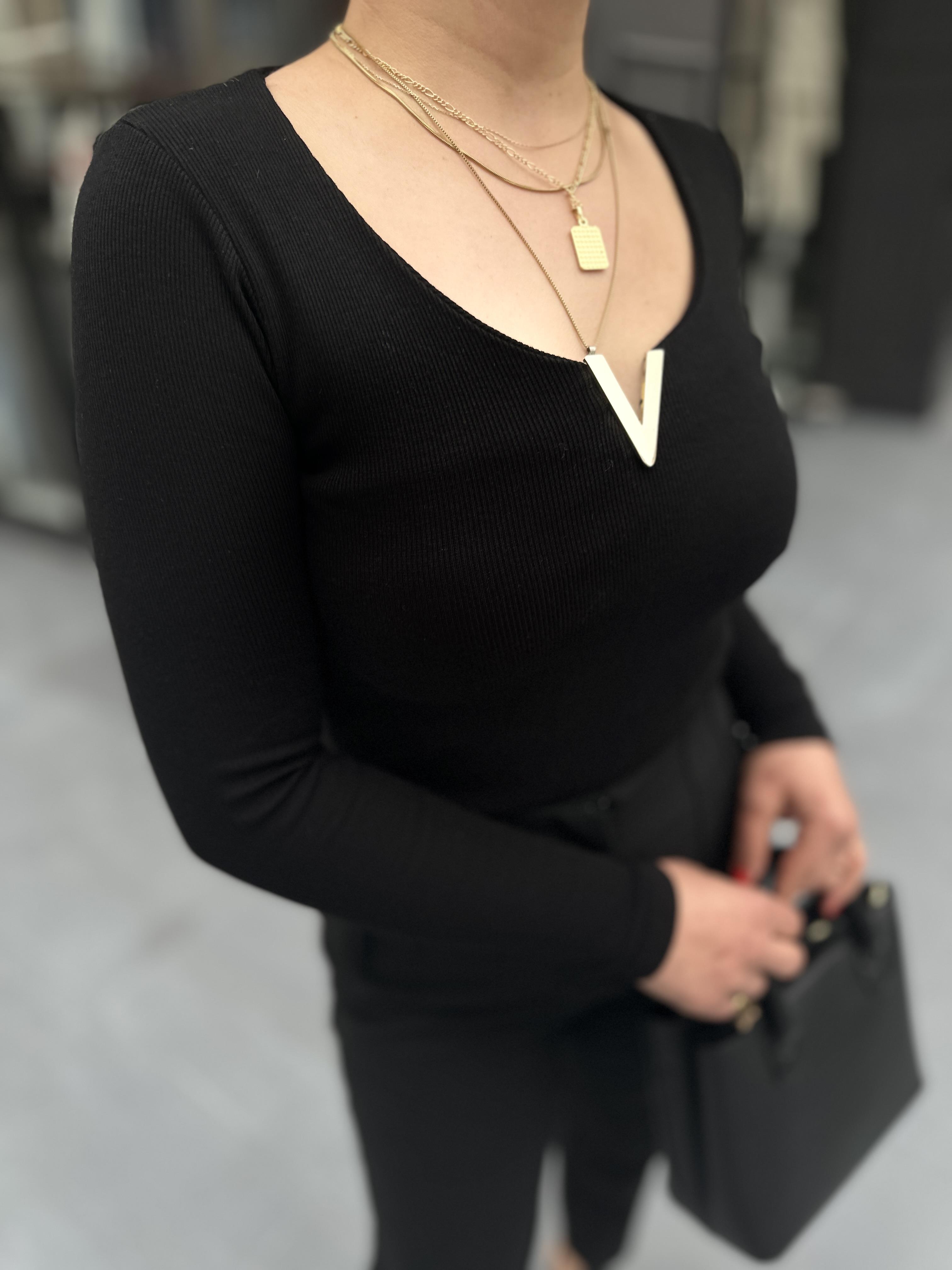 Black Ribbed Blouse with Gold Accessory Details