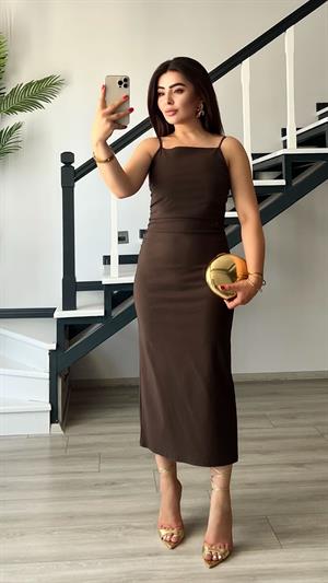 Coffee-colored ruched dress with adjustable straps.
