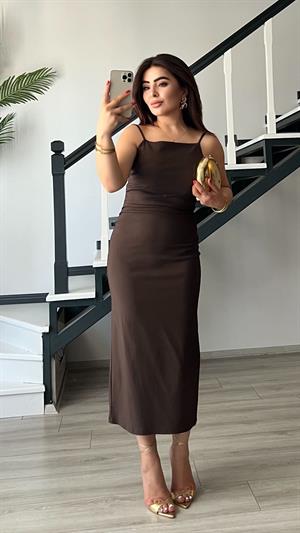 Coffee-colored ruched dress with adjustable straps.