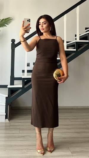 Coffee-colored ruched dress with adjustable straps.
