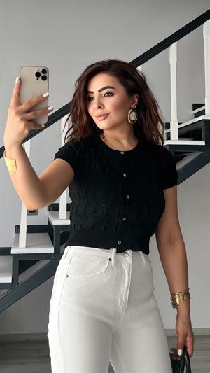 كارديجان أسود محبوك بياقة دائرية وأزرار