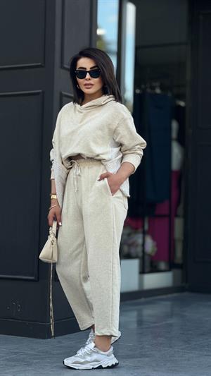 Stone-colored hooded suit with shirt detail.