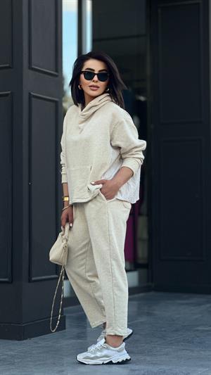 Stone-colored hooded suit with shirt detail.