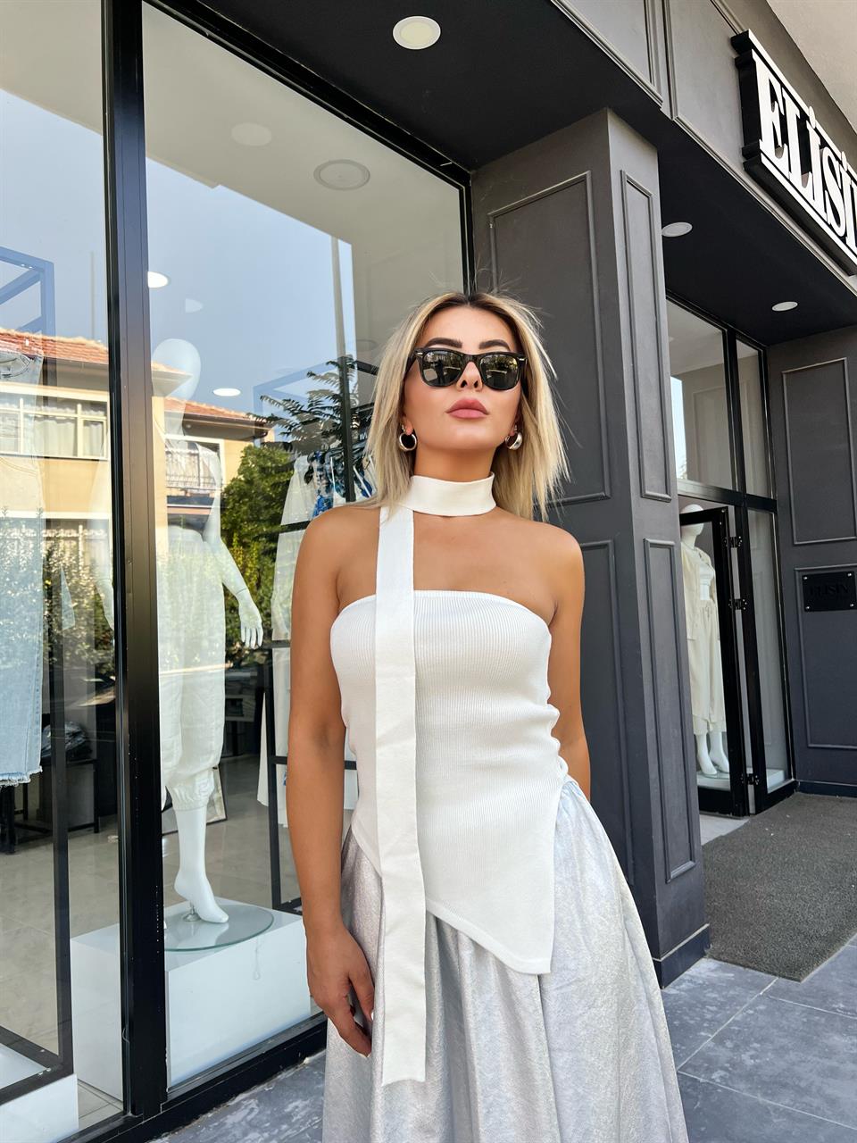 Off-white strapless blouse with scarf detail