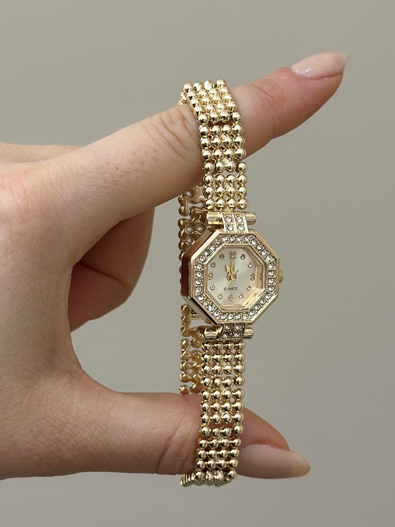 Saat Metal Taş Gold Renk