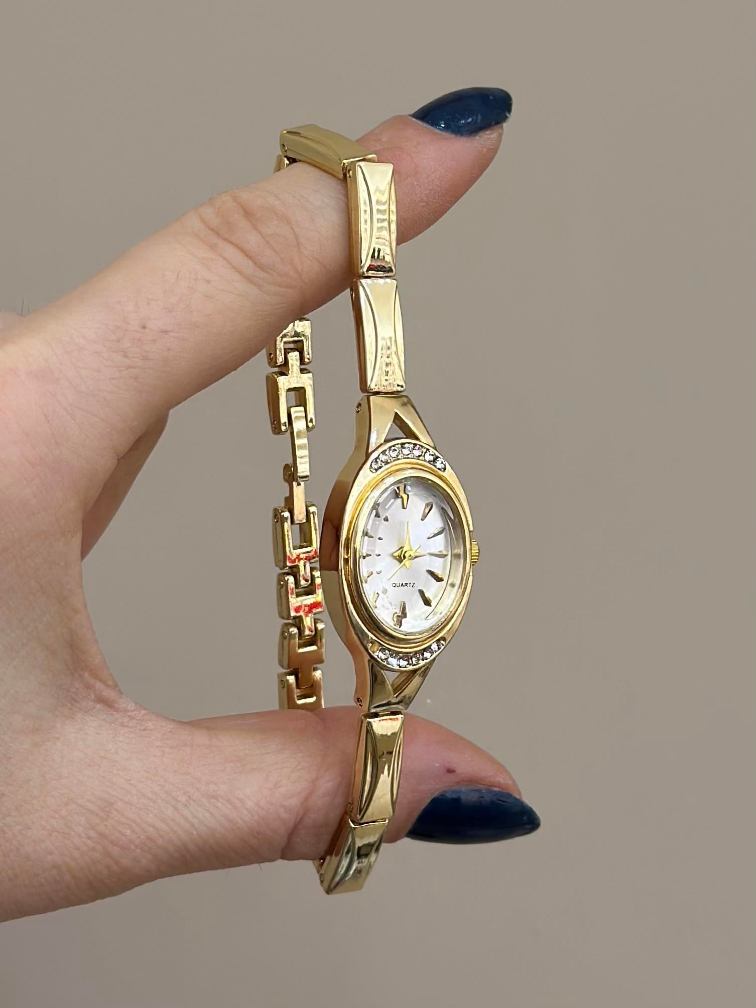 Saat Metal Taş Gold Renk 