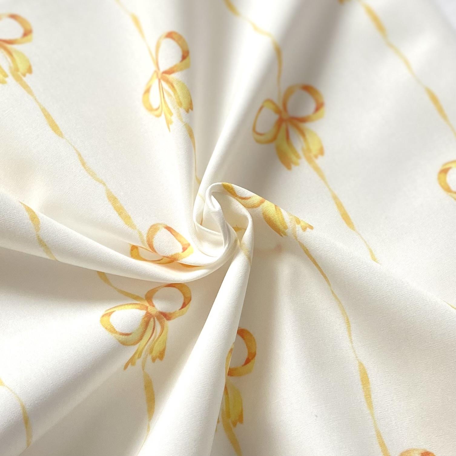 Yellow Bow Poplin Fabric