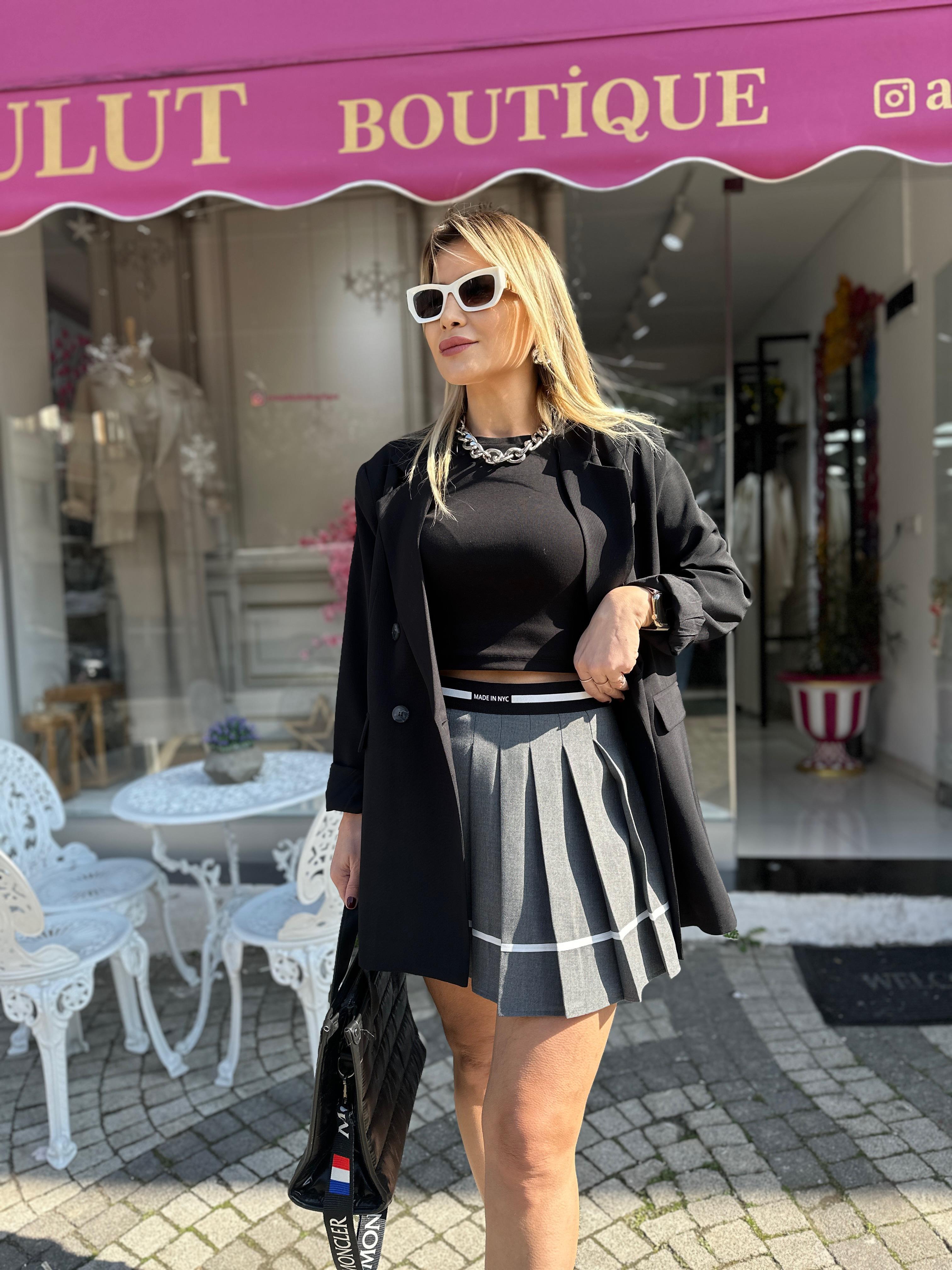 Gri Pileli Yazı Detay Etek