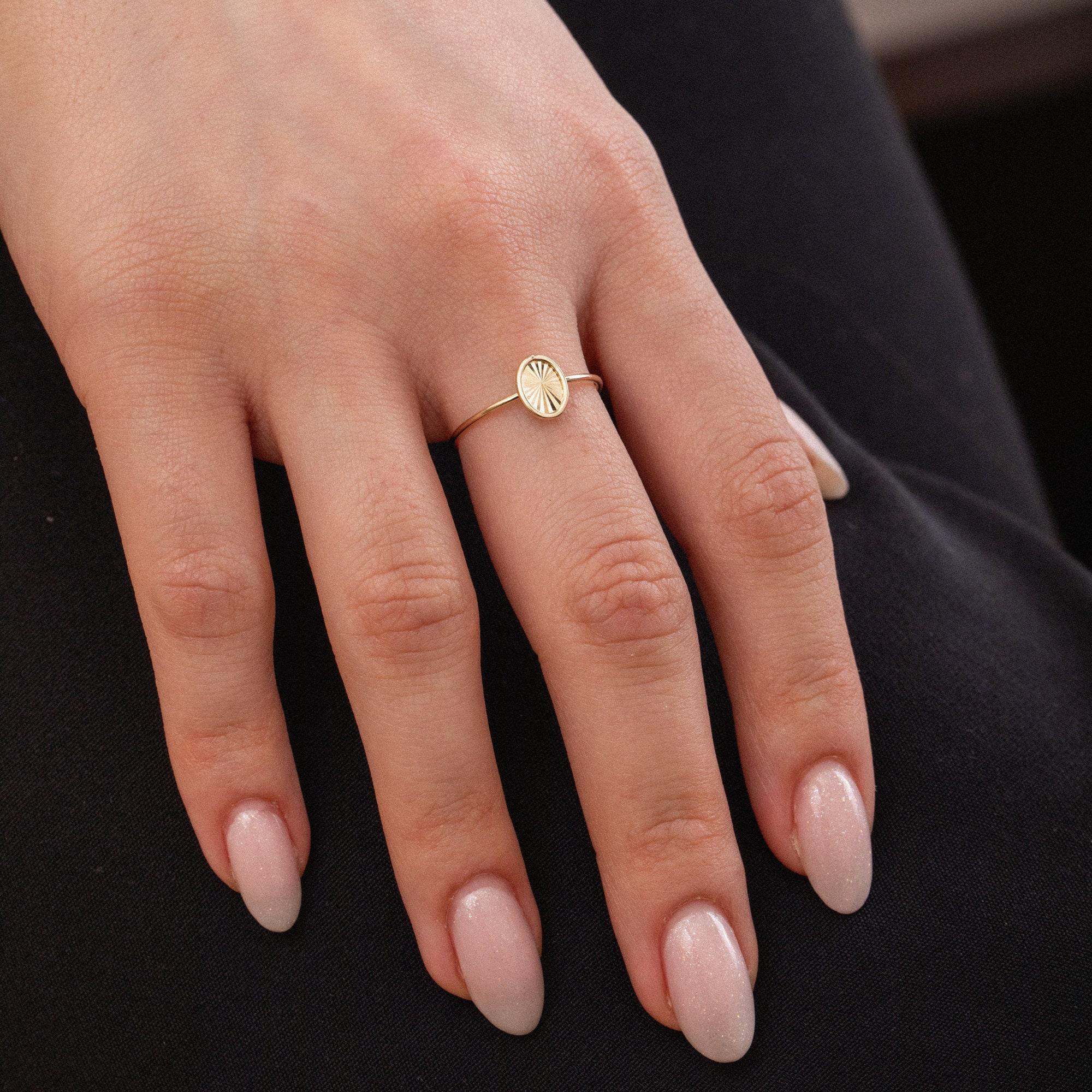 Gold Oval Textured Disc Ring