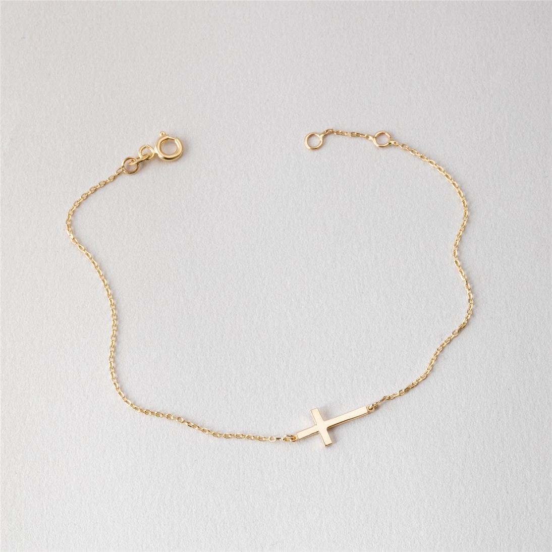Solid Gold Sideways Cross Bracelet