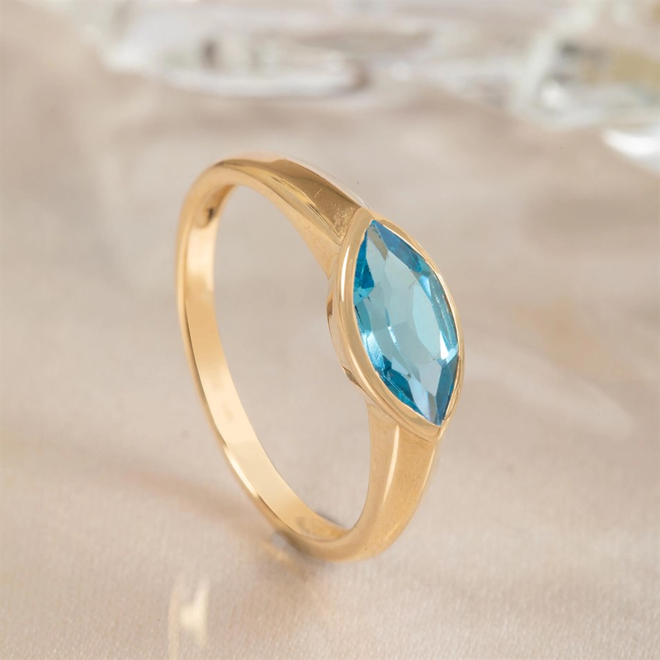 Gold Marquise Blue Topaz Ring