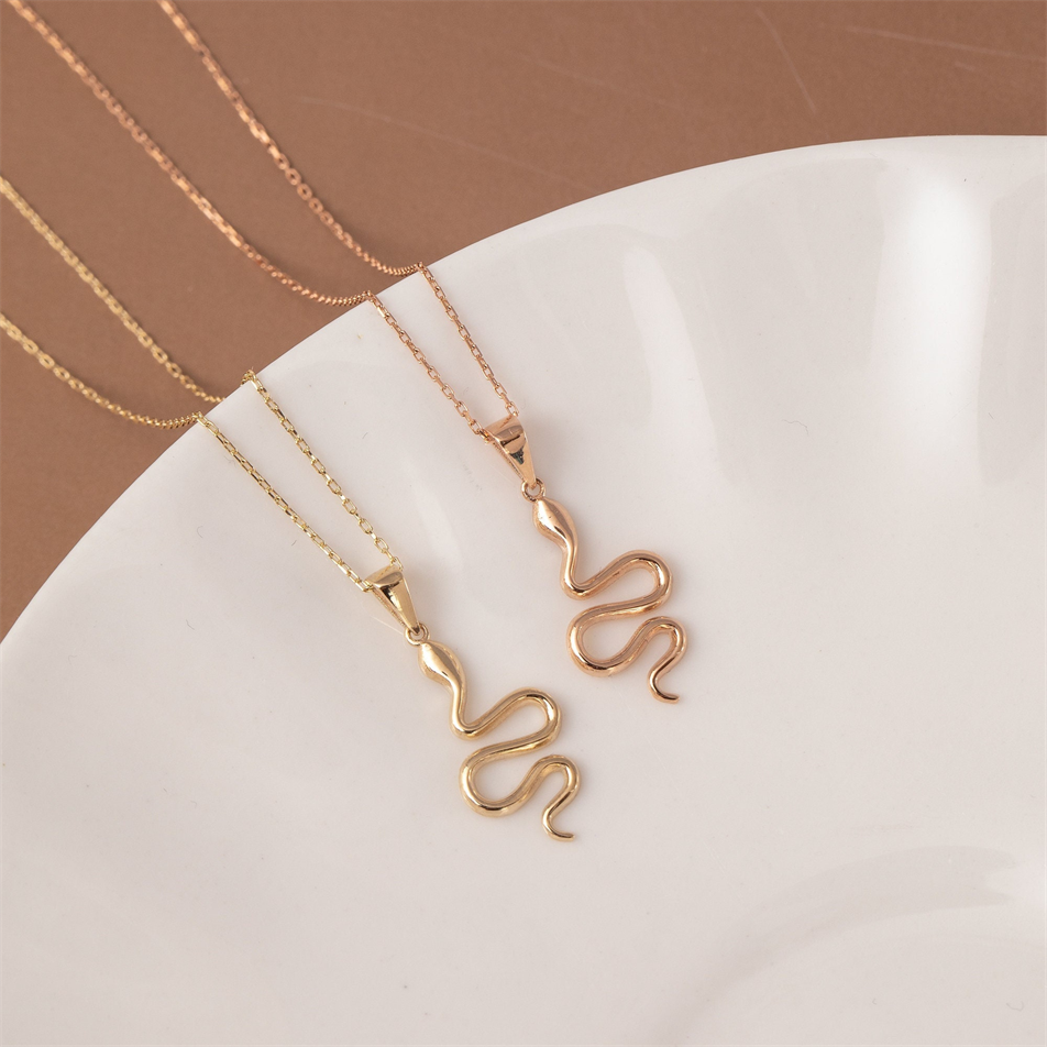 Gold Snake Charm Necklace