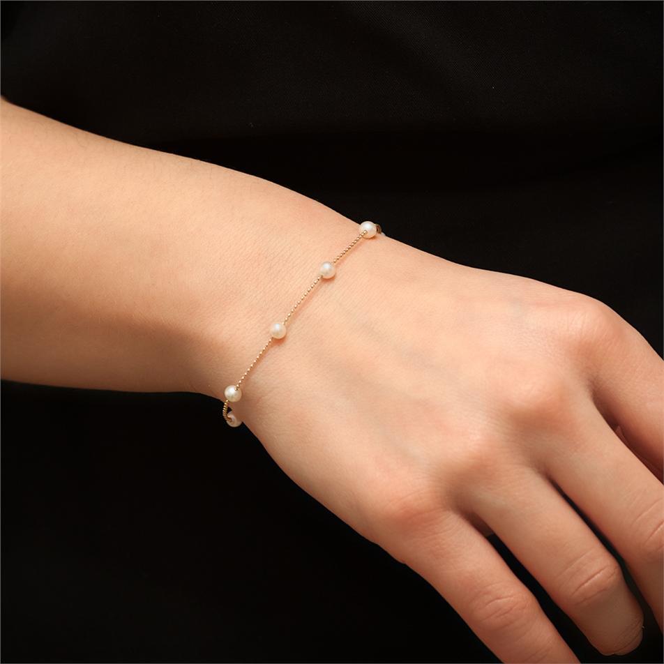 Solid Gold Pearl String Bracelet