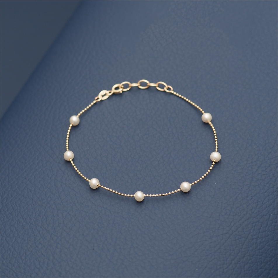 Solid Gold Pearl String Bracelet