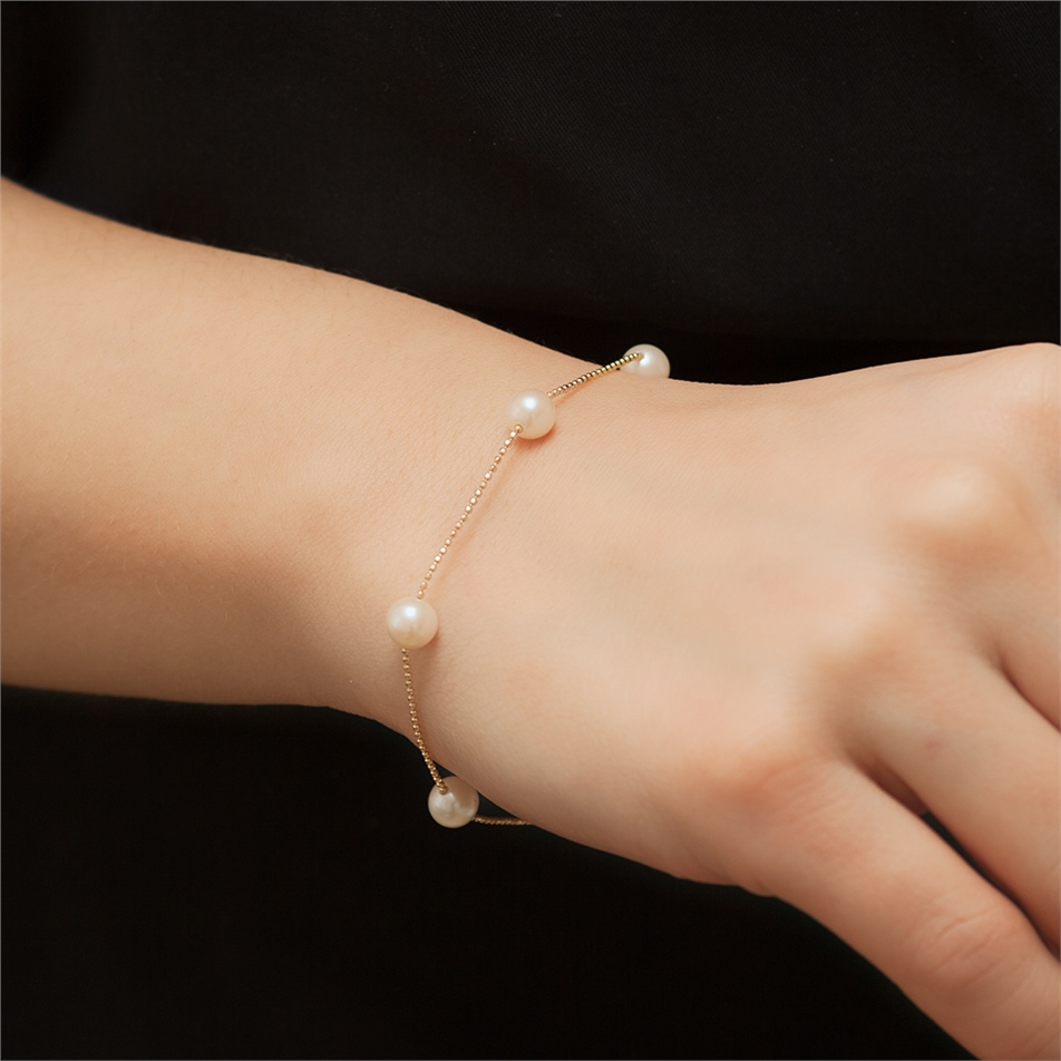 Solid Gold Pearl String Bracelet