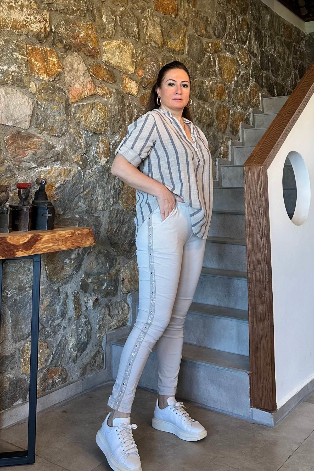 Yan Zımbalı Ve Sim Şerit Detaylı Full Likralı Pantolon Bej
