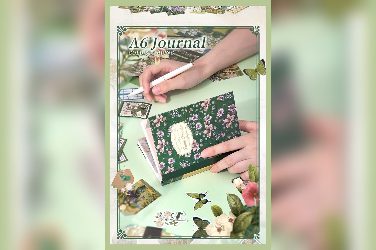 Botanik temalı A6 scrapbook defterine elle not yazılırken, etrafında sticker ve kelebekler