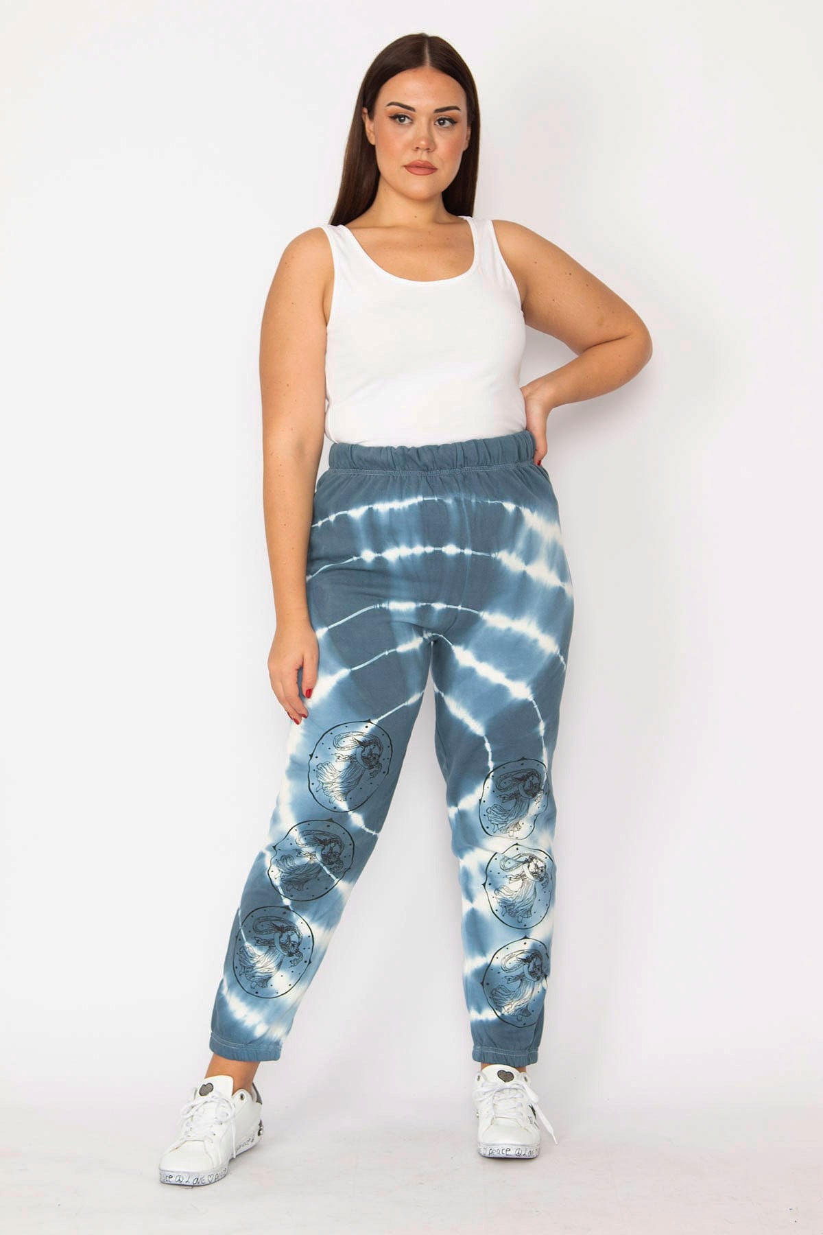 Kadın Mavi İçi Şardonlu 3 İplik Kumaş Bel Ve Paça Lastikli Batik Desenli Pantolon 65N29151