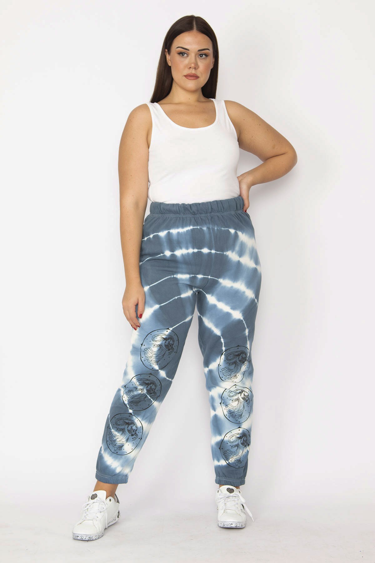 Kadın Mavi İçi Şardonlu 3 İplik Kumaş Bel Ve Paça Lastikli Batik Desenli Pantolon 65N29151