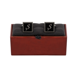 Zekupp, Ş Harfli Kol Düğmesi