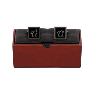 Zekupp, Ü Harfli Kol Düğmesi