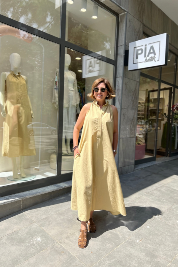 SARI BOYUNDAN DÜĞMELİ PARAŞÜT KUMAŞ ELBİSE