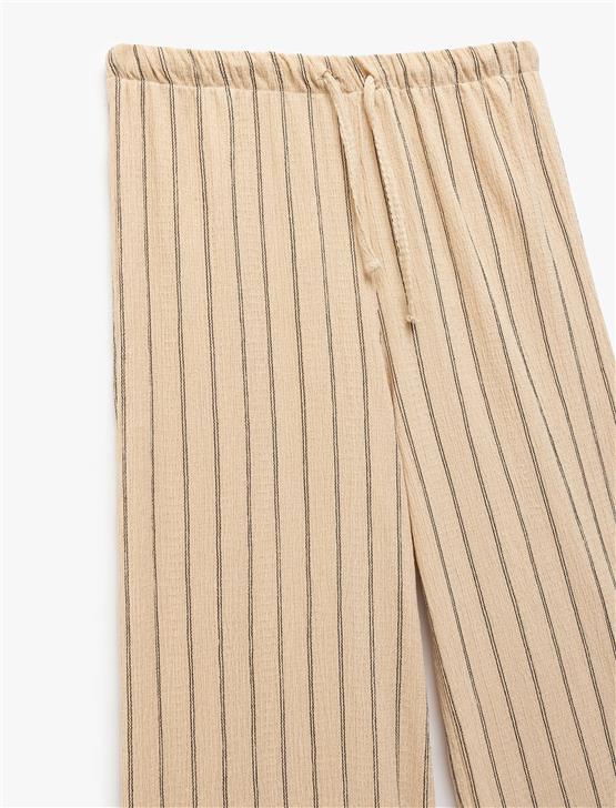 Koton 5Sal40001Ik 0S5 Bej Cızgılı Genc Kız Elastan Jersey Pantolon