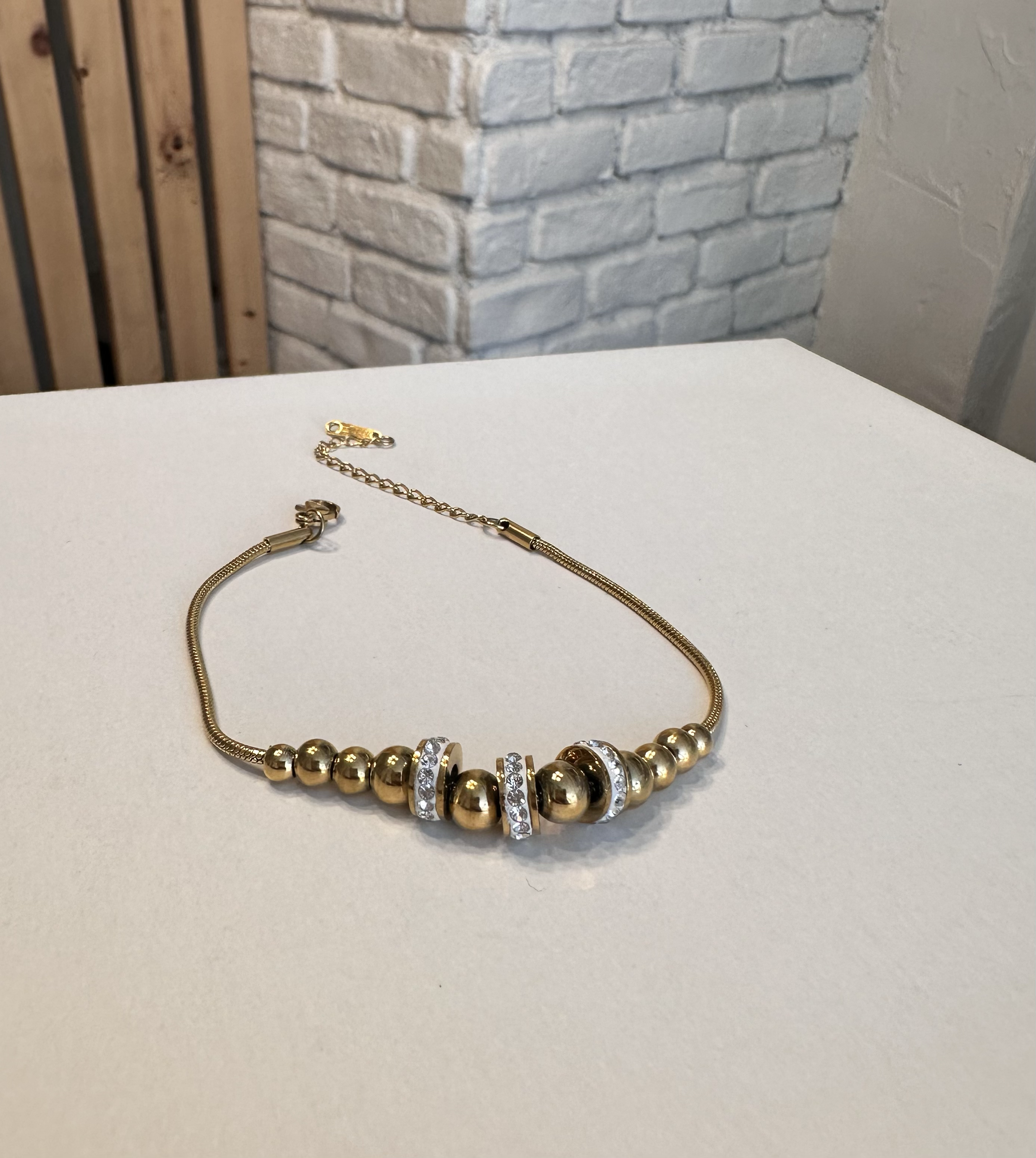 Çelik Gold Renk Top Detaylı Bileklik