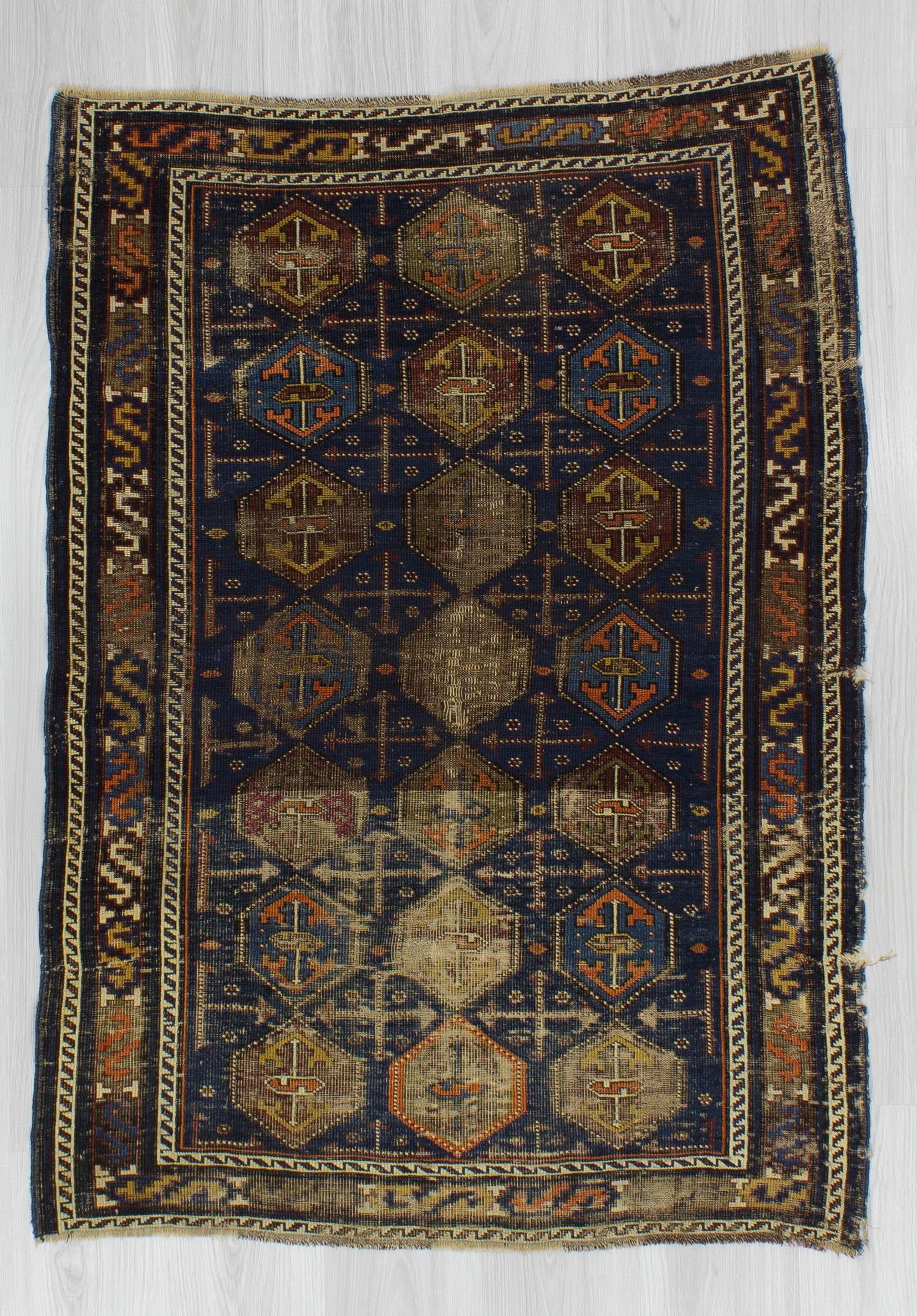 Distressed Antique Baluch Rug