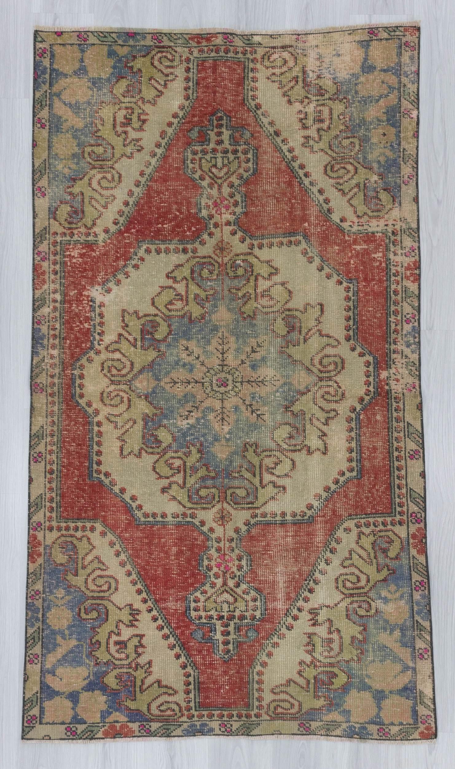 Vintage distressed decorative Turkish rug