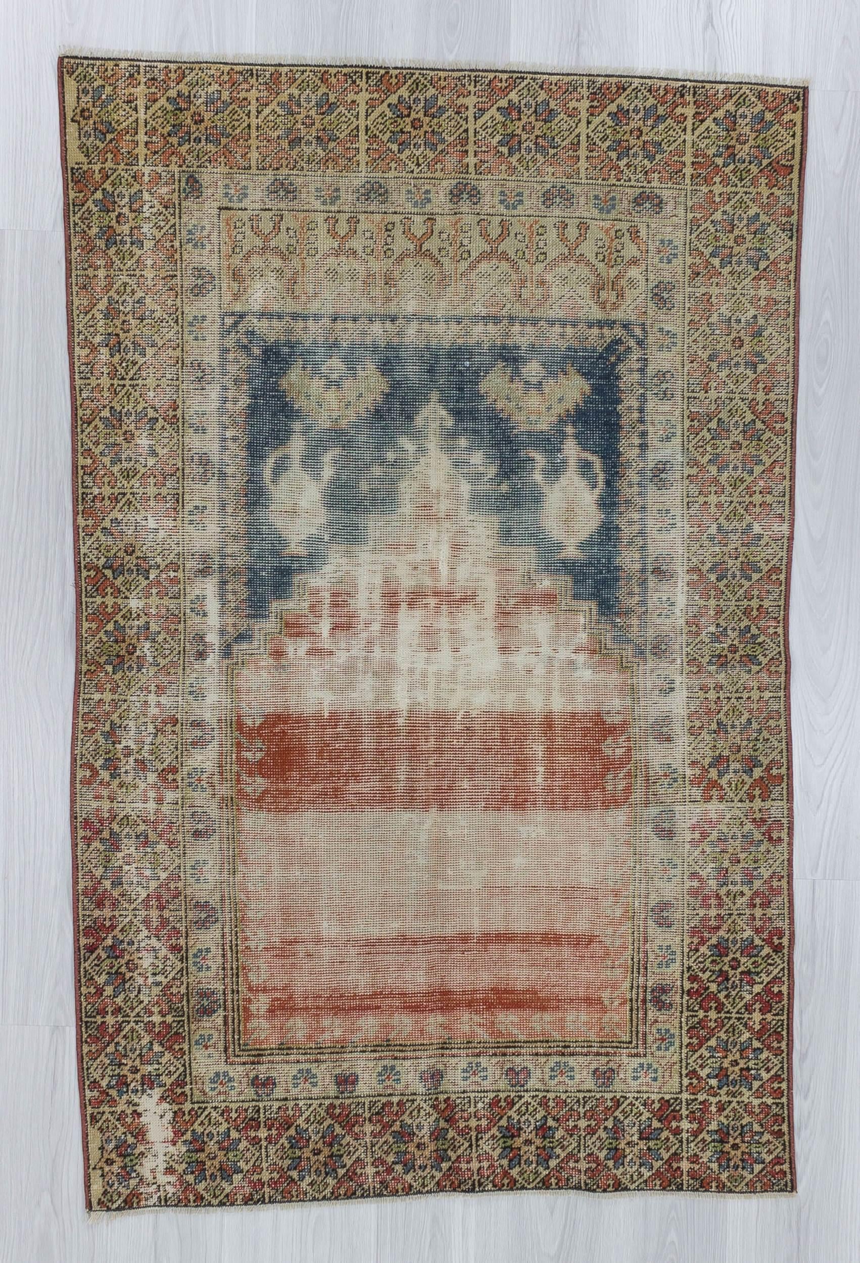 Vintage distressed Turkish prayer rug