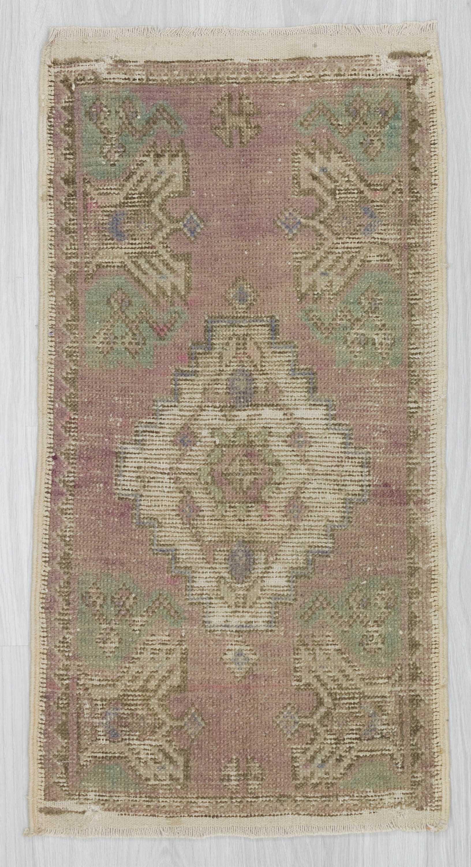 Distressed mini Turkish rug