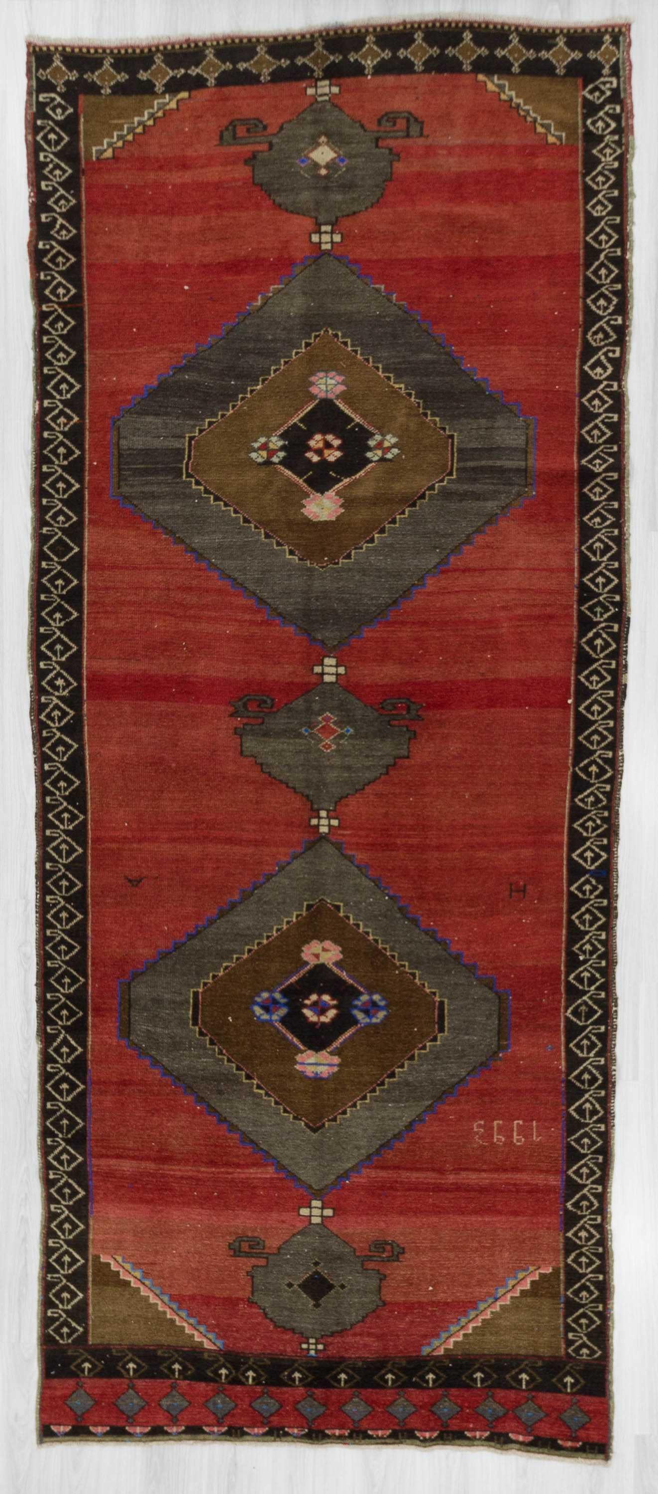 Decorative vintage Turkish Kars rug