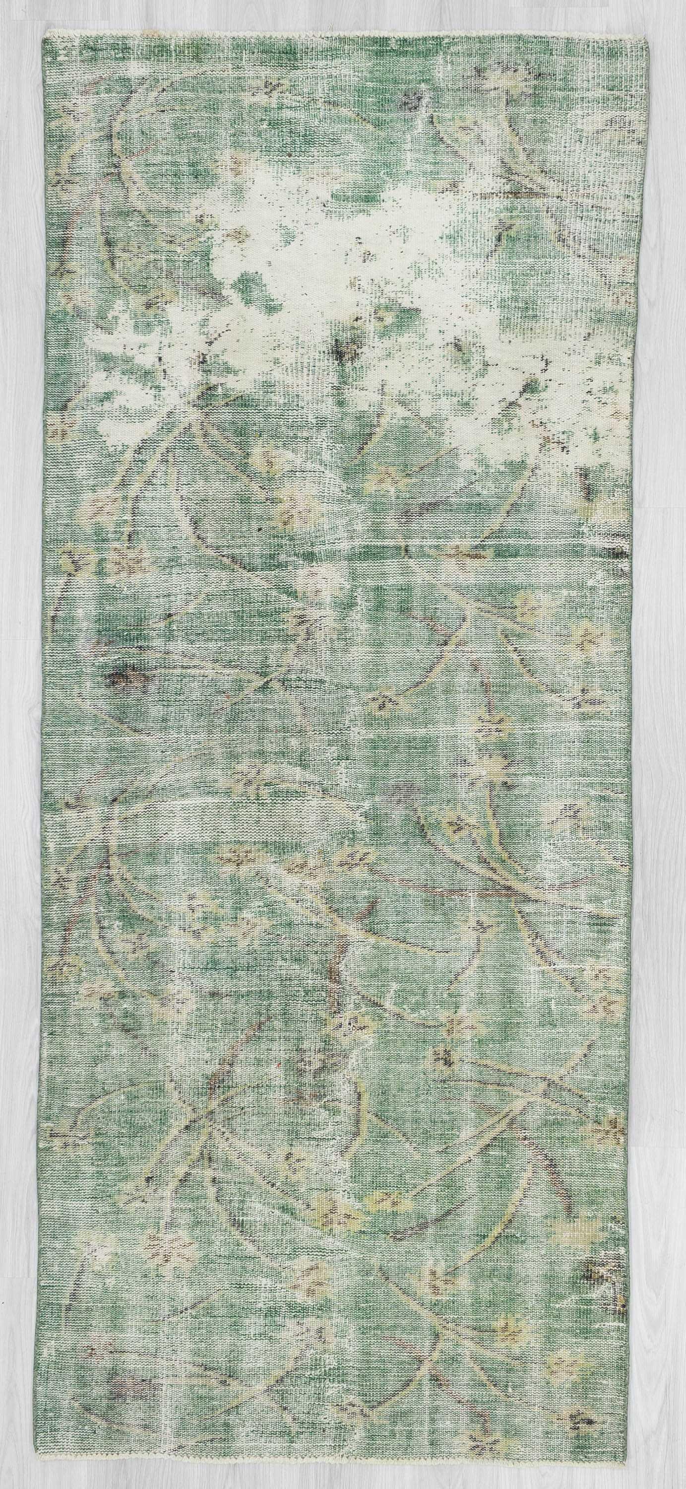 Distressed green Turkish deco rug