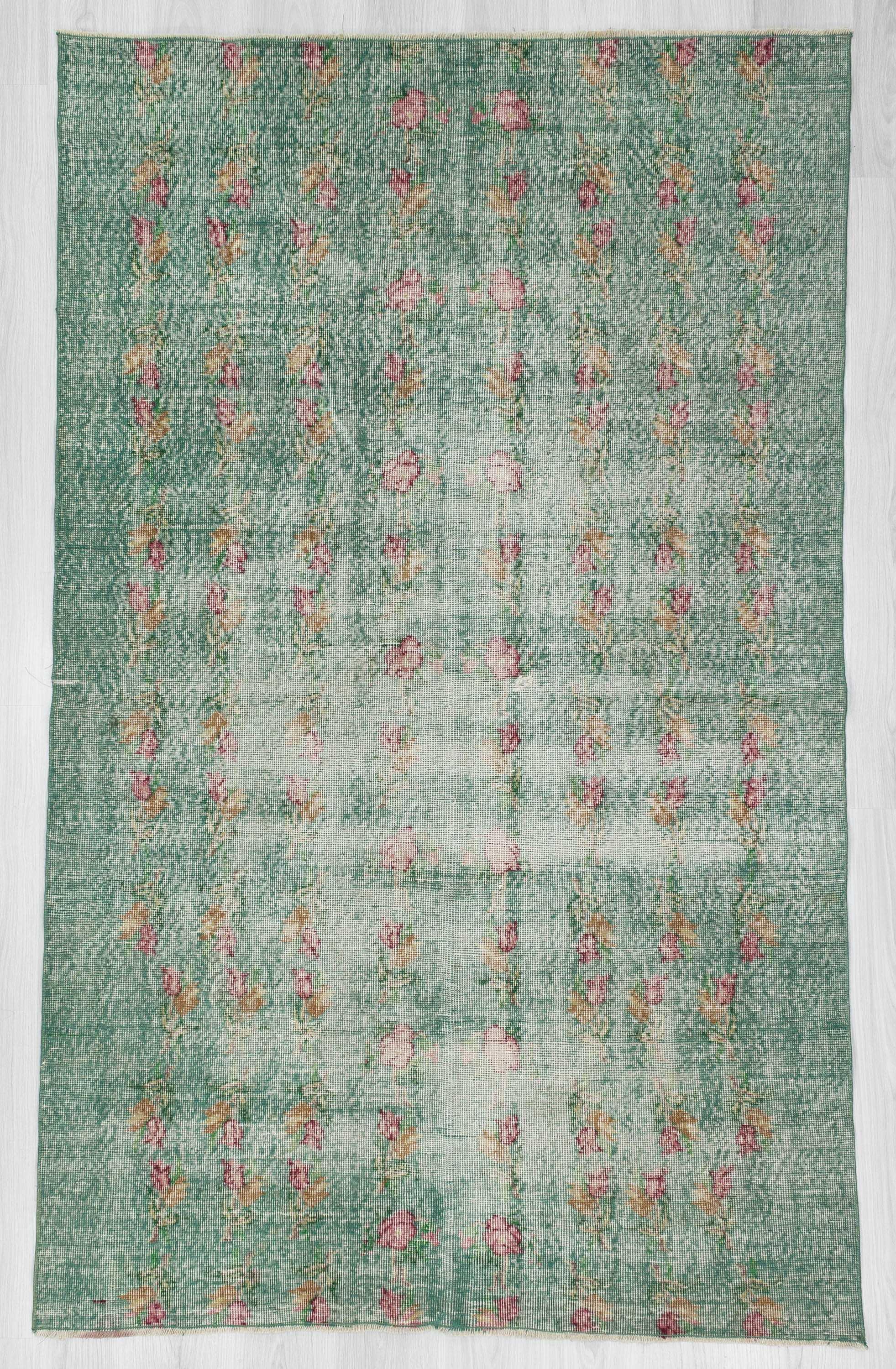 Distressed green Turkish deco rug