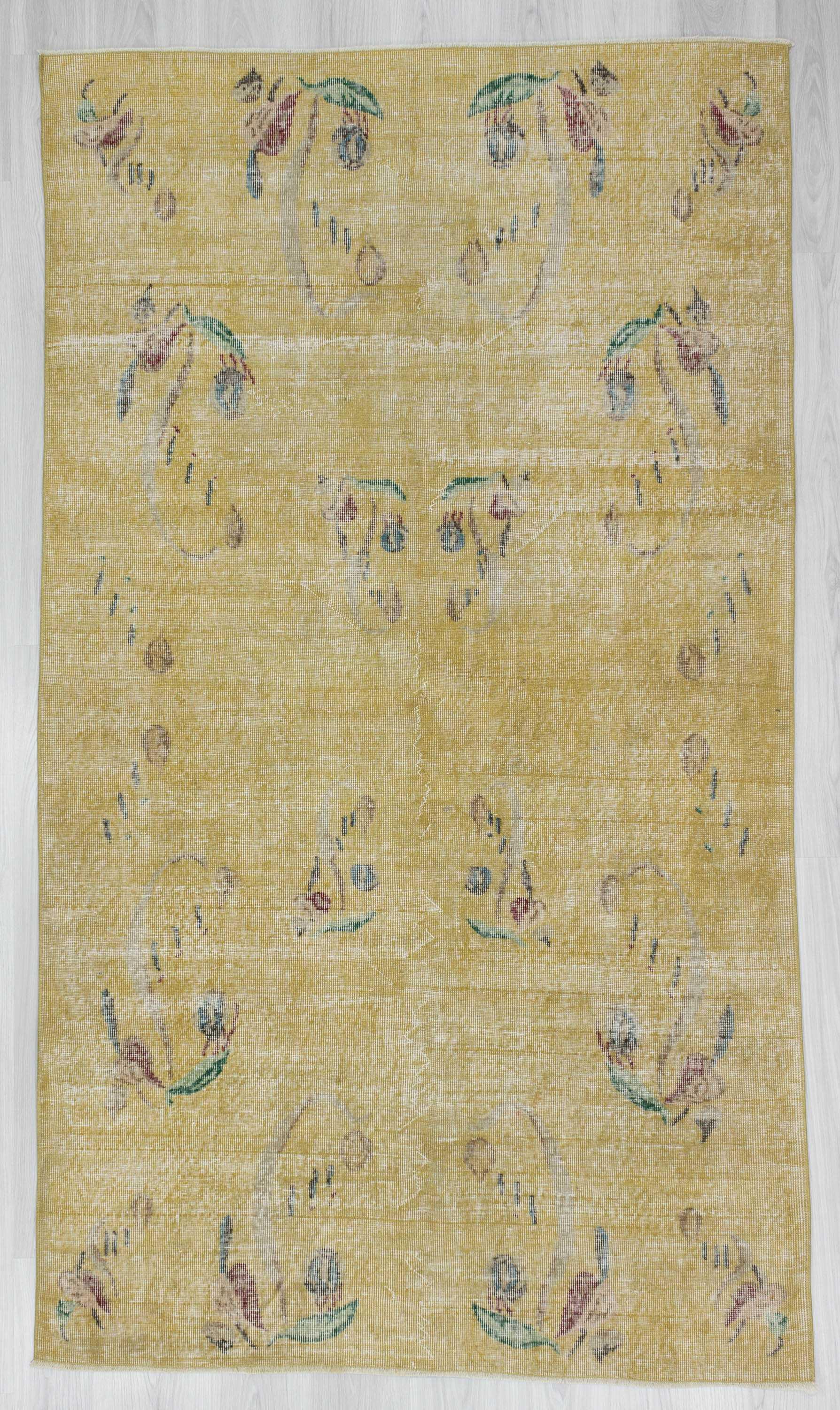Distressed vintage yellow Turkish deco rug