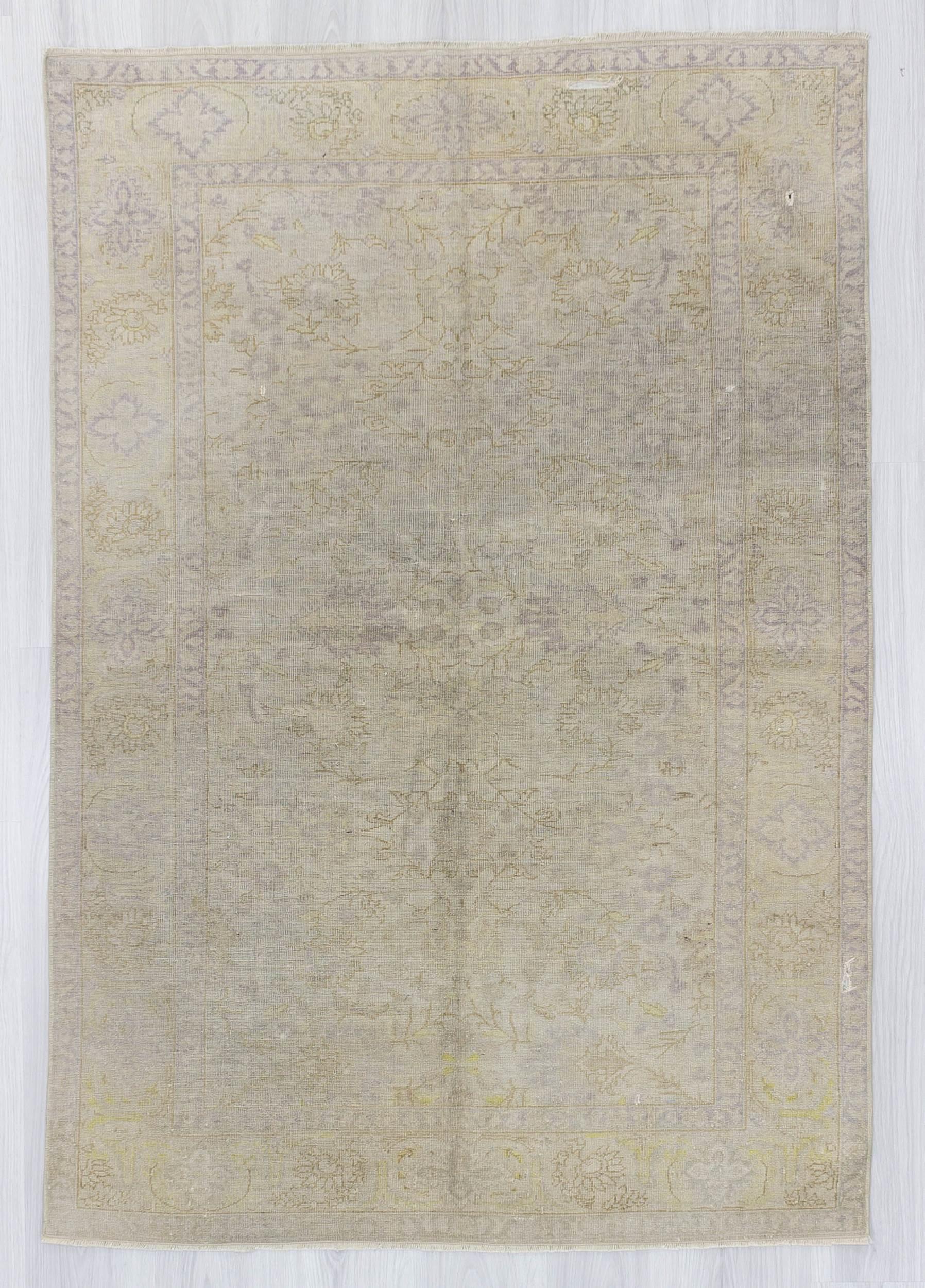 Distressed washed out Turkish rug