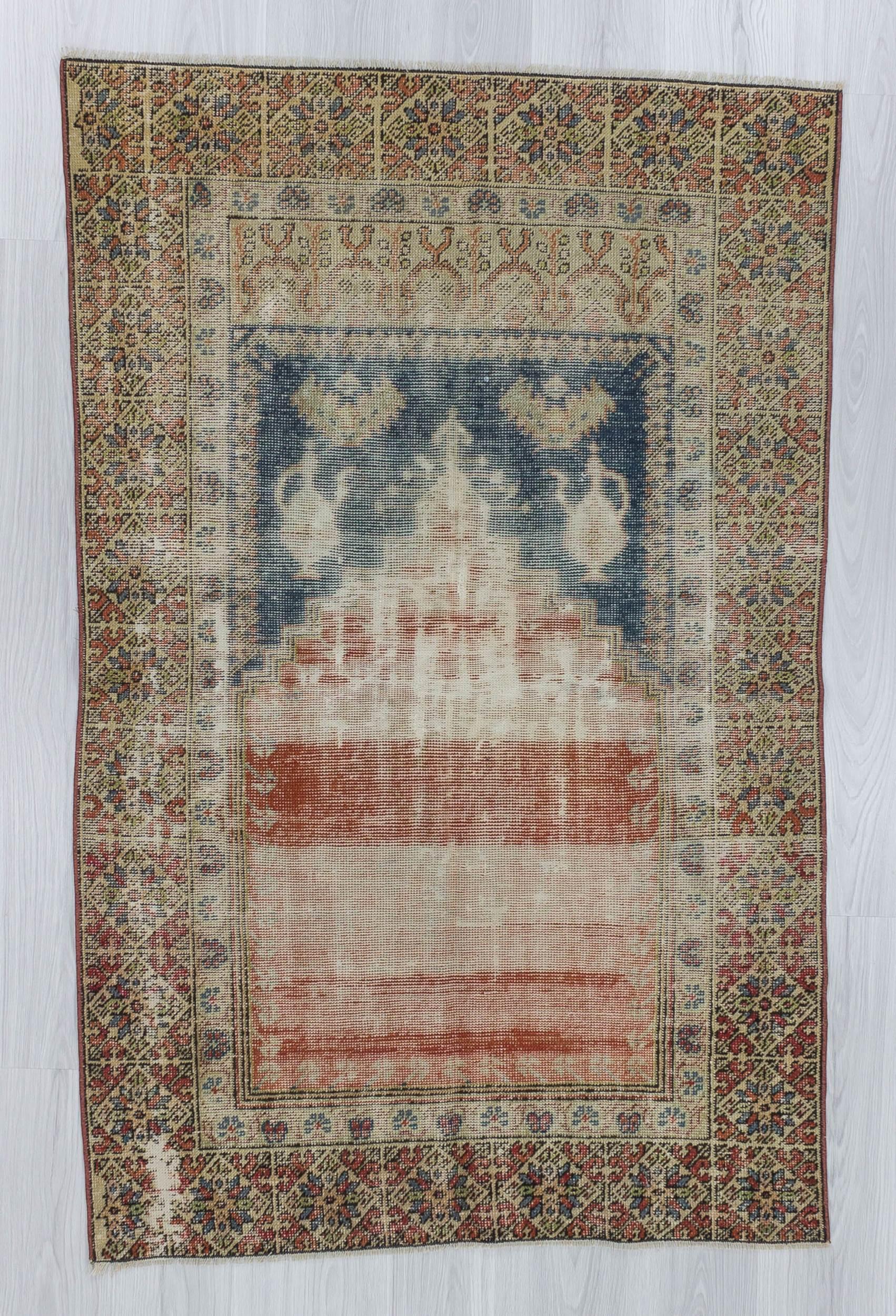 Vintage distressed Turkish prayer rug