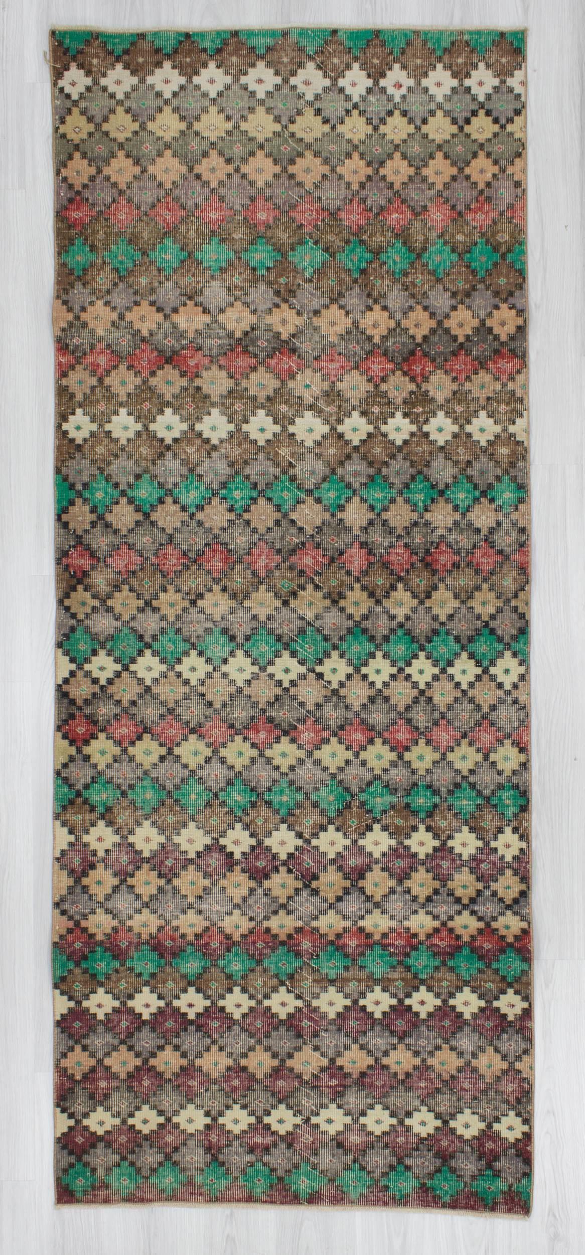 Vintage hand-knotted decorative Turkish art deco rug